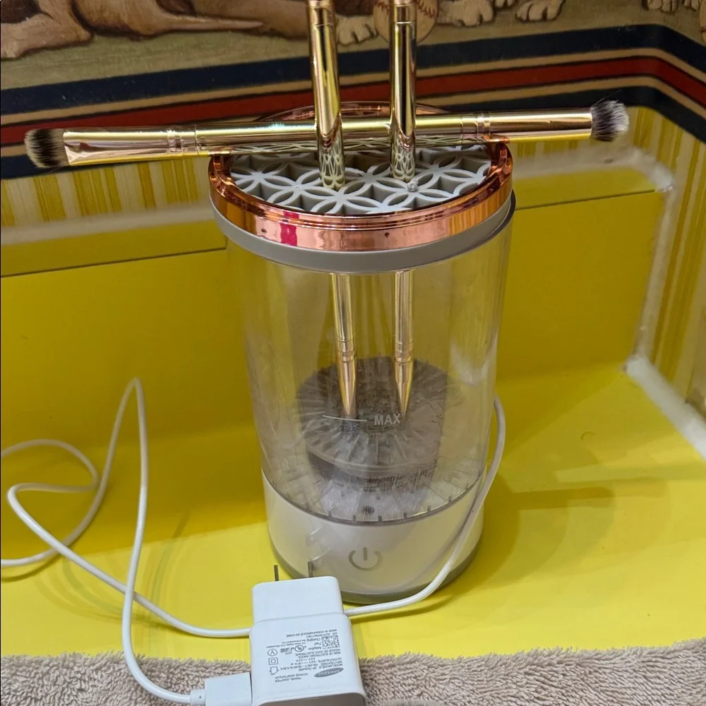 Makeup brush cleaning tool. electric USB cable charger. Used